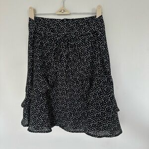 Medium, black and white polka dot skirt from Altar’d State
